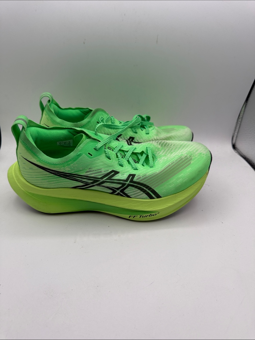 Asics MEGA BLAST 5 men’s 6 approx women’s 7.5 Neon Green Turbo Racing Shoes S1